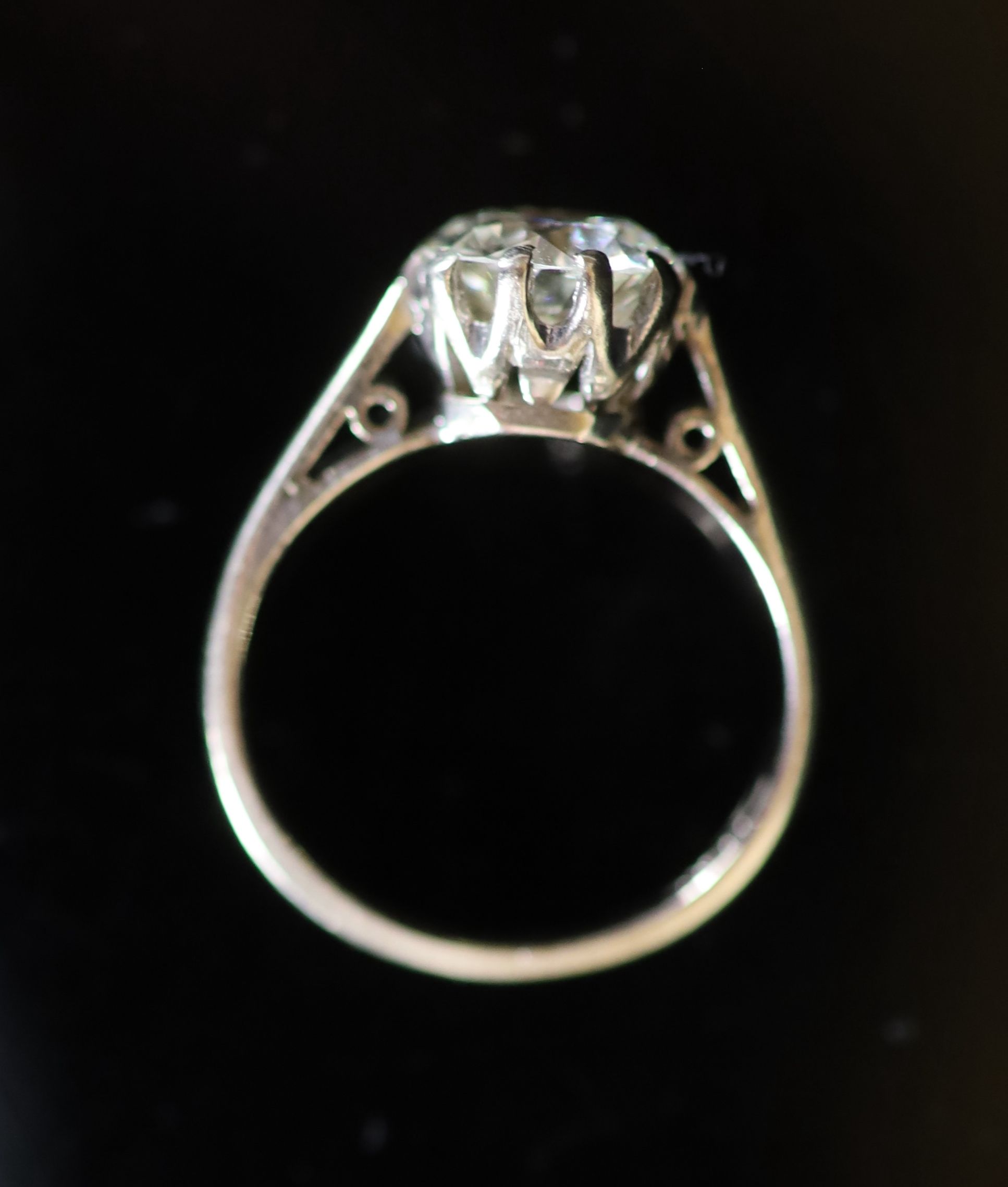 A modern 18ct white gold and solitaire diamond ring